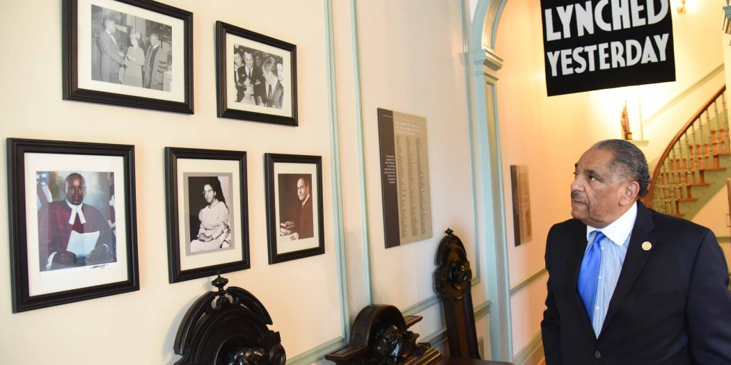 MD Senator (Ret.) Michael Bowen Mitchell looks on at family pictures inside the museum