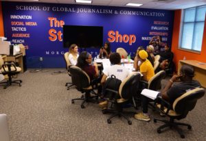 students around conference table